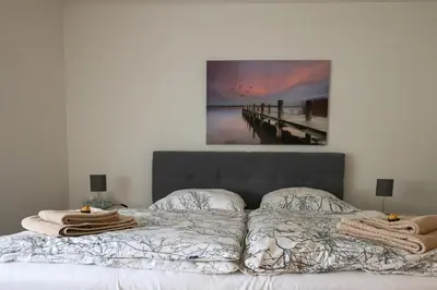 Ein Bett oder Betten in einem Zimmer der Unterkunft Helle 4 ZKB mit Balkon in Wittlich