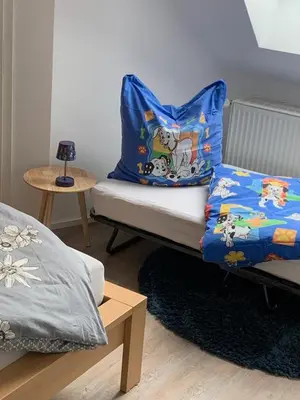 Ein Bett oder Betten in einem Zimmer der Unterkunft Ferienwohnung Leonardo