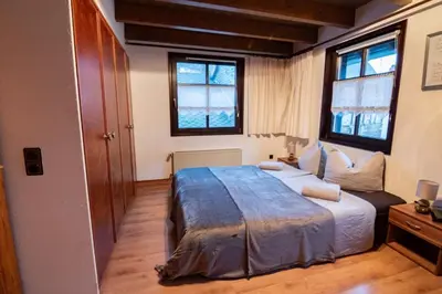 Ein Bett oder Betten in einem Zimmer der Unterkunft Ferienhaus Haus am Pütz