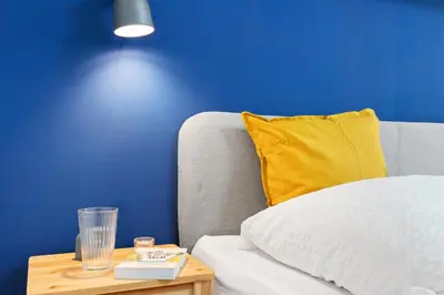 Ein Bett oder Betten in einem Zimmer der Unterkunft Moderne, Zentrale und Gemütliche Unterkunft