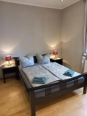 Ein Bett oder Betten in einem Zimmer der Unterkunft Brautröckchen