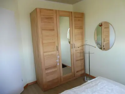 Ein Bett oder Betten in einem Zimmer der Unterkunft Ferienwohnung Luise Blum