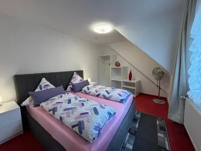 Ein Bett oder Betten in einem Zimmer der Unterkunft Mosel River View Attic Apartment - Up to 3 Guests , 3rd floor