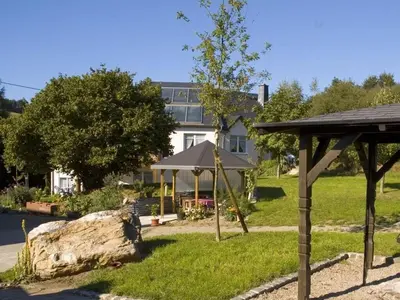 Ein Garten an der Unterkunft Mühlenhof - Müller Thurgau