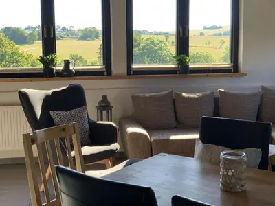 Ein Sitzbereich in der Unterkunft Chalet St Lambertus Apartment A