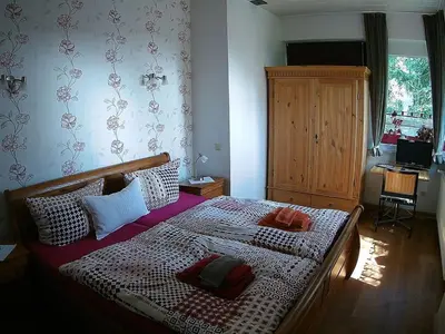 Ein Bett oder Betten in einem Zimmer der Unterkunft Winegrower's apartment holiday residence