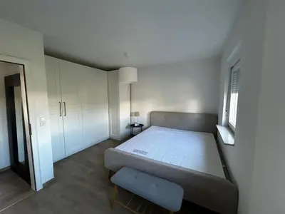 Ein Bett oder Betten in einem Zimmer der Unterkunft Altes Weinhaus