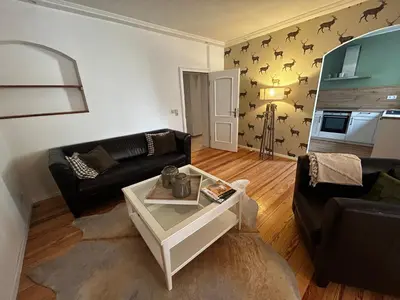 Ein Sitzbereich in der Unterkunft Altes Weinhaus