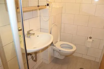 Ein Badezimmer in der Unterkunft Pensione Italia