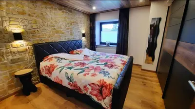 Ein Bett oder Betten in einem Zimmer der Unterkunft Mayesch Hof