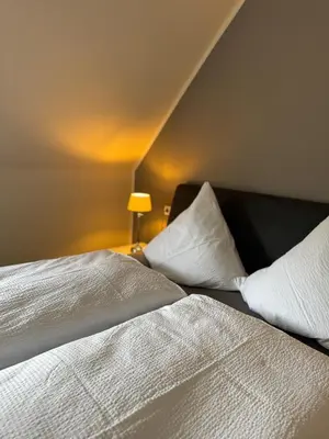 Ein Bett oder Betten in einem Zimmer der Unterkunft Ferienwohnung Maas