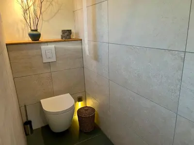Ein Badezimmer in der Unterkunft Tinyhouse Minimalus III mit Whirlpool im Grünen