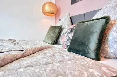 Ein Bett oder Betten in einem Zimmer der Unterkunft LIVING Apartments / FeWo Neuwied