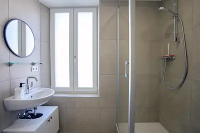 Ein Badezimmer in der Unterkunft LIVING Apartments / FeWo Neuwied