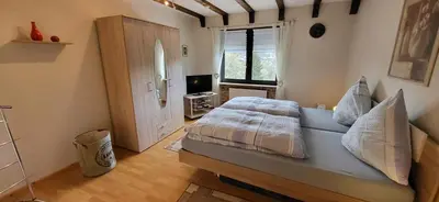 Ein Bett oder Betten in einem Zimmer der Unterkunft Haus Maria