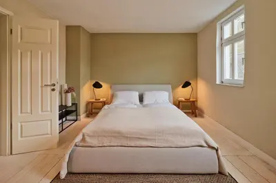 Ein Bett oder Betten in einem Zimmer der Unterkunft Moseltraum - Großzügiges Townhouse mit Sauna & Sonnenterrasse - Platz für 6 Personen - Marvin Jeske Retreats
