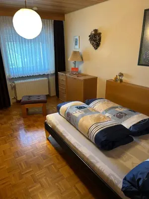 Ein Bett oder Betten in einem Zimmer der Unterkunft Land-Haus Sonnenhang
