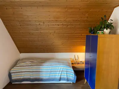 Ein Bett oder Betten in einem Zimmer der Unterkunft Ferienwohnungen Burgstraße 8