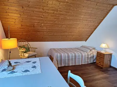 Ein Bett oder Betten in einem Zimmer der Unterkunft Ferienwohnungen Burgstraße 8