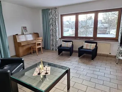 Ein Sitzbereich in der Unterkunft Ferienwohnungen Burgstraße 8