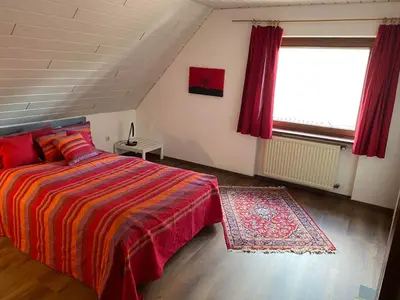 Ein Bett oder Betten in einem Zimmer der Unterkunft Ferienwohnungen Burgstraße 8