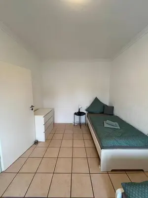 Ein Bett oder Betten in einem Zimmer der Unterkunft Renovierte Wohnungen in Koblenz direkt an der Mosel!