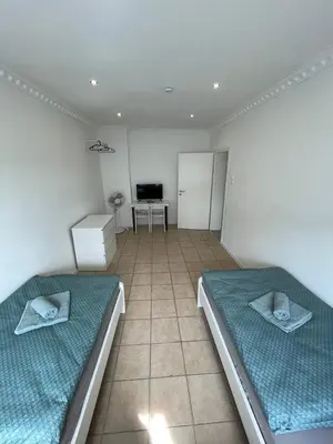 Ein Bett oder Betten in einem Zimmer der Unterkunft Renovierte Wohnungen in Koblenz direkt an der Mosel!