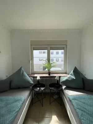 Ein Bett oder Betten in einem Zimmer der Unterkunft Renovierte Wohnungen in Koblenz direkt an der Mosel!