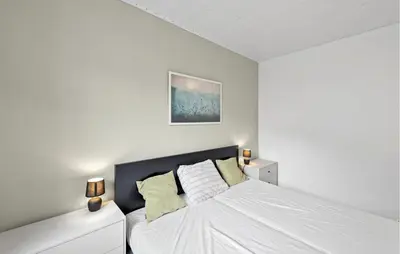 Ein Bett oder Betten in einem Zimmer der Unterkunft 2 Bedroom Awesome Apartment In Malberg