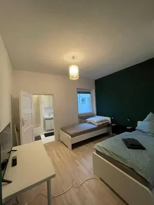 Ein Bett oder Betten in einem Zimmer der Unterkunft Charmante Wohnungen direkt in der Stadtmitte
