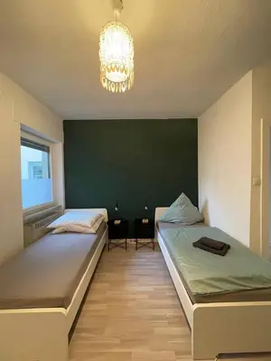 Ein Bett oder Betten in einem Zimmer der Unterkunft Charmante Wohnungen direkt in der Stadtmitte