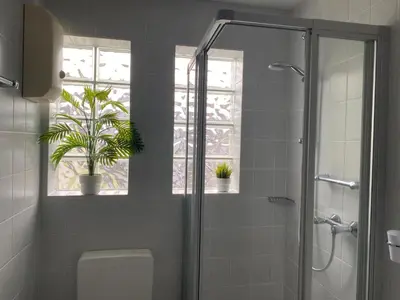 Ein Badezimmer in der Unterkunft Ferienwohnung 1 Am Petersberg