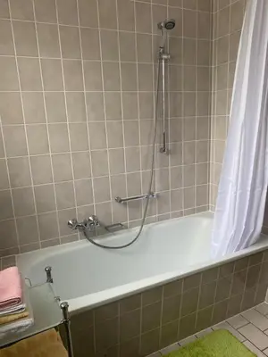 Ein Badezimmer in der Unterkunft Ferienwohnung 2 Am Petersberg