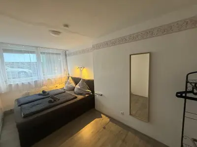 Ein Bett oder Betten in einem Zimmer der Unterkunft Ferienwohnung Sonnenblume