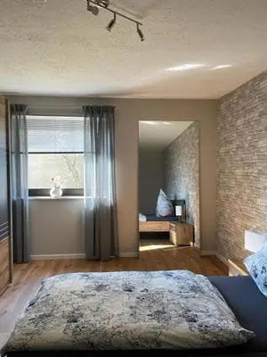 Ein Bett oder Betten in einem Zimmer der Unterkunft NEU! Ferienwohnung Kleine Auszeit