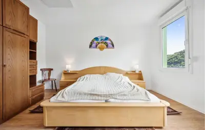 Ein Bett oder Betten in einem Zimmer der Unterkunft Rheinblick