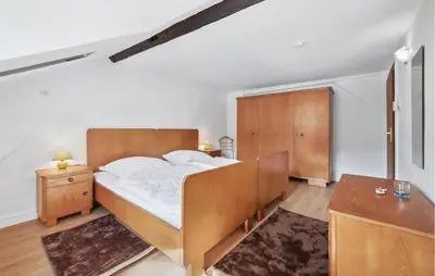 Ein Bett oder Betten in einem Zimmer der Unterkunft Pfalzblick
