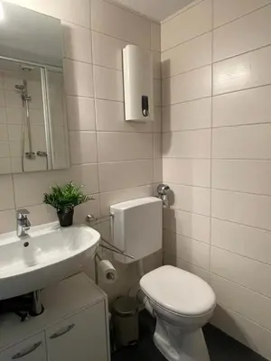 Ein Badezimmer in der Unterkunft Cozy Central Apartment
