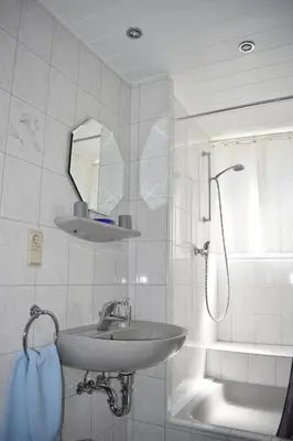 Ein Badezimmer in der Unterkunft Ferienwohnungen und Gästezimmer Peter Busch