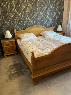 Ein Bett oder Betten in einem Zimmer der Unterkunft FeWo Anastasija