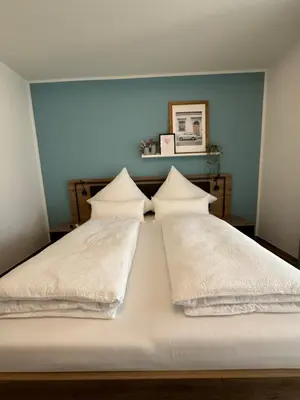 Ein Bett oder Betten in einem Zimmer der Unterkunft Neu!!! Ferienwohnung Mosel 106,5
