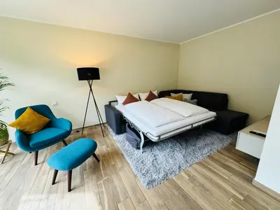 Ein Bett oder Betten in einem Zimmer der Unterkunft Neu!!! Ferienwohnung Mosel 106,5