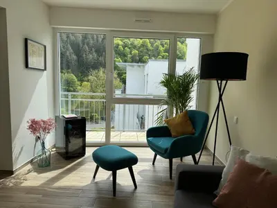 Ein Sitzbereich in der Unterkunft Neu!!! Ferienwohnung Mosel 106,5