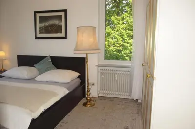 Ein Bett oder Betten in einem Zimmer der Unterkunft Little Rhine View Château - UG Apartment