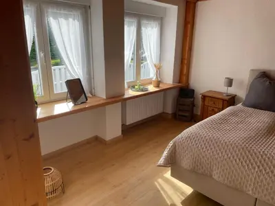 Ein Bett oder Betten in einem Zimmer der Unterkunft Das kleine Gasthaus