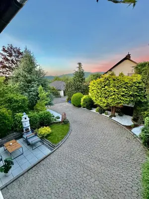 Ein Garten an der Unterkunft Ferienwohnung Waldborn-Suite an der Mosel