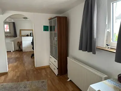 Ein Bett oder Betten in einem Zimmer der Unterkunft Privatzimmer mit eigenem Bad und Blick auf den Rhein