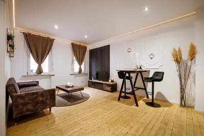 Ein Sitzbereich in der Unterkunft Vintage Apartment 2 Black am Kurpark von Bad Ems