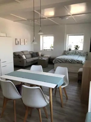 Ein Sitzbereich in der Unterkunft Traumhaftes Studioappartement