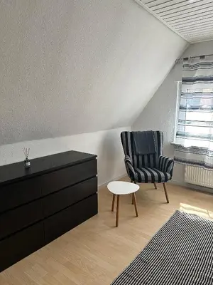Ein Sitzbereich in der Unterkunft Haus Daniela Oberstadt